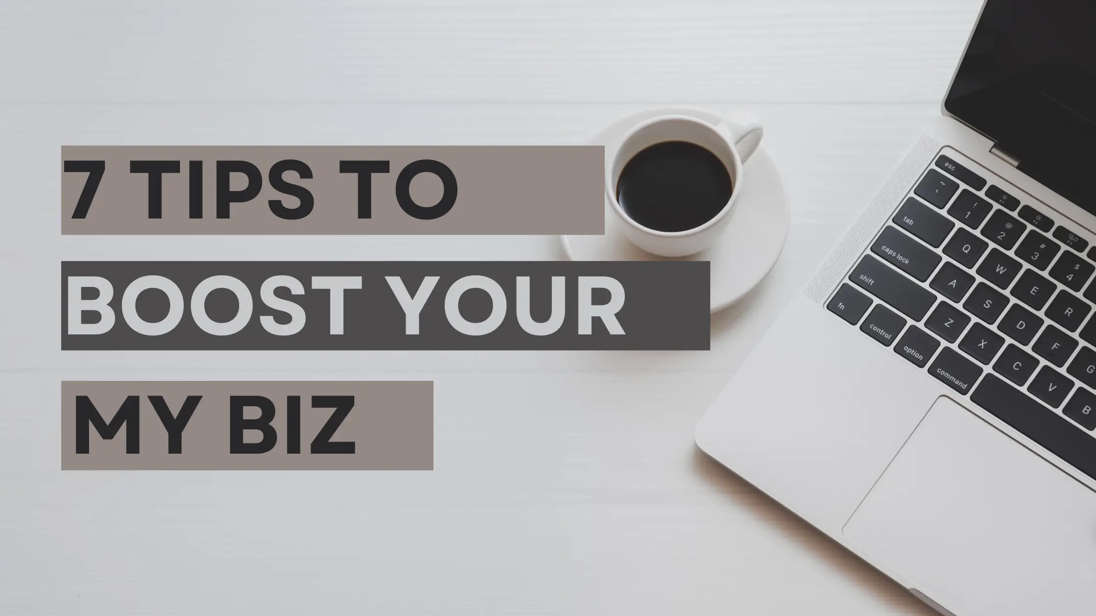 coffee and laptop and text saying 7 tips to boost your my biz